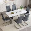 Table and chair set.63*31.4 Inch Snow Mountain White Sintered Stone Dining Table Set - 6 Dark Gray High-quality PU Chairs With Arched Metal Legs.Perfe
